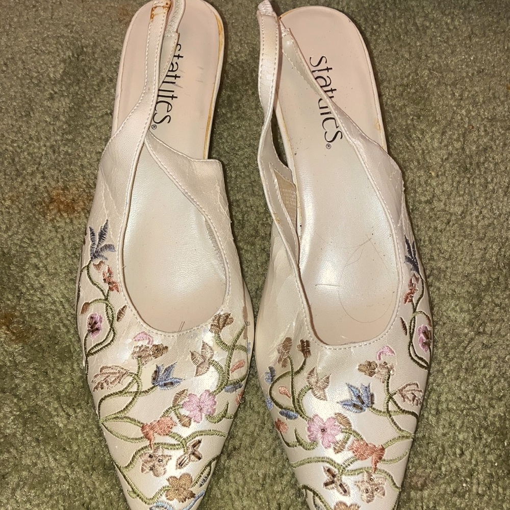 white floral statutes heels